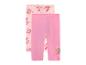 Deux leggings capri roses pour filles avec des imprimés de chiots de dessins animés.