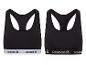 Deux soutiens-gorge de sport noirs avec le logo Reebok.