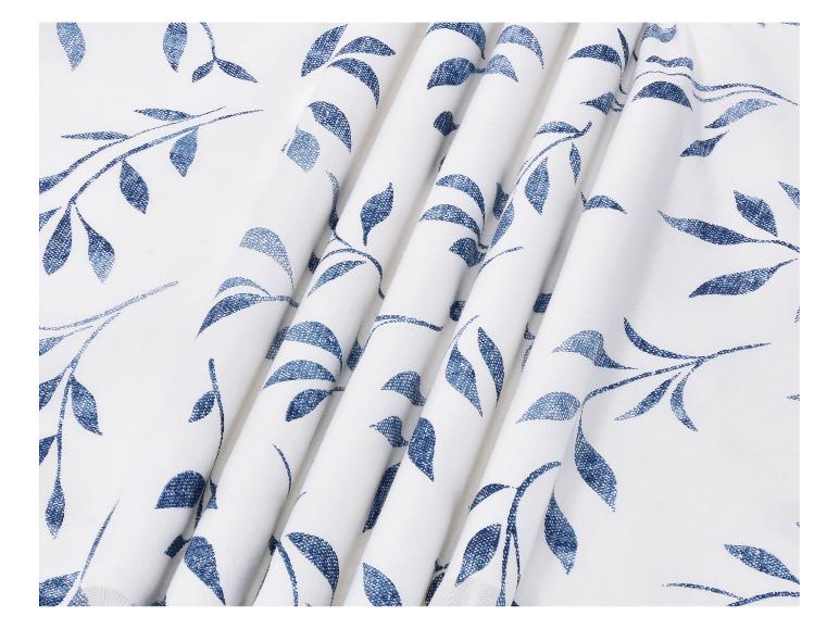 Tissu blanc avec imprimé feuilles bleues et plis