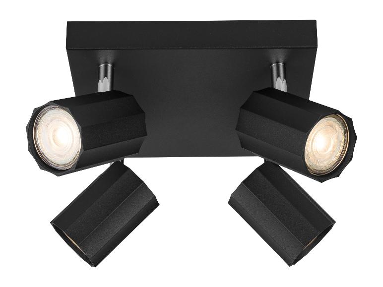 Plafonnier carré noir avec quatre lumières réglables.