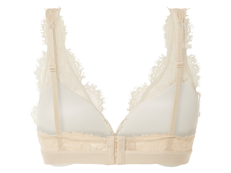 Soutien-gorge beige en dentelle avec bretelles réglables.