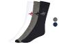 Trois paires de chaussettes avec un motif de cheval en blanc, gris et bleu foncé.