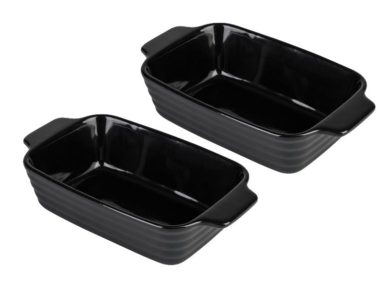 Deux plats à gratin rectangulaires noirs avec des poignées.