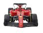 Une voiture de course de Formule 1 Ferrari rouge avec le parrainage de V-Power.