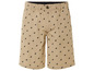 Short beige avec un motif de cavaliers noirs