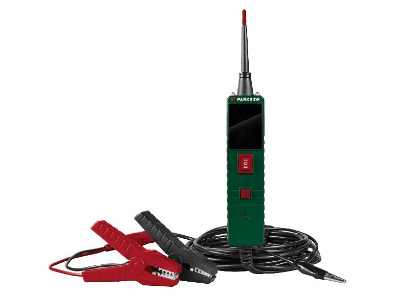 Un testeur de circuit électrique vert et noir avec des pinces rouges et noires, sur fond blanc.