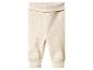 Pantalon bébé côtelé beige clair avec une large ceinture repliable et des chevilles resserrées.