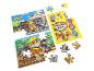 Trois puzzles pour enfants sur le thème de la construction avec des chiots, partiellement assemblés.