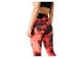 Leggings de sport rouges à motif marbre pour femmes.