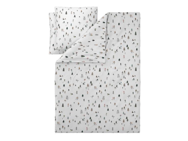 Parure de lit blanche avec un motif de personnes et d'arbres.