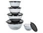 Ensemble de cinq bols mélangeurs en verre avec couvercles noirs, empilés.