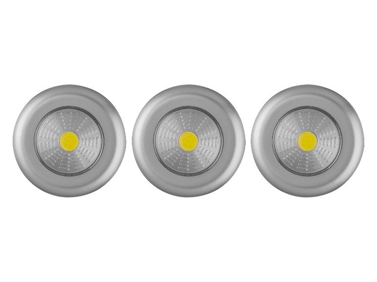 Trois lampes LED rondes argentées avec un centre jaune