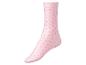 Une chaussette rose avec des points rouges.