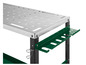 Un établi avec un plateau de table perforé, des porte-outils verts et une base en métal noir.