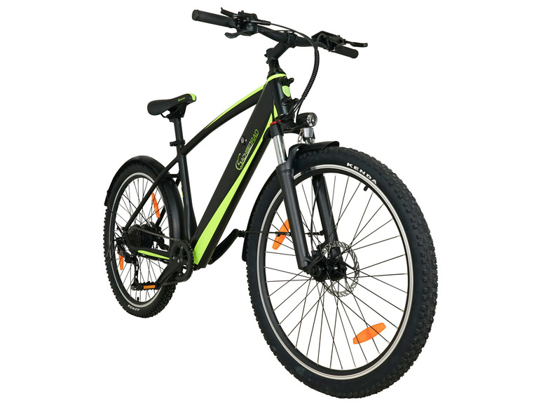 Un vélo électrique noir avec des accents verts et des pneus Kenda.