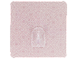 Crochet adhésif transparent sur fond rose à motif géométrique.