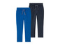 Deux pantalons de jogging pour garçons, un bleu et un gris.