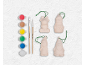 Kit de décoration de Noël à peindre avec peintures, pinceaux et quatre figurines en céramique.