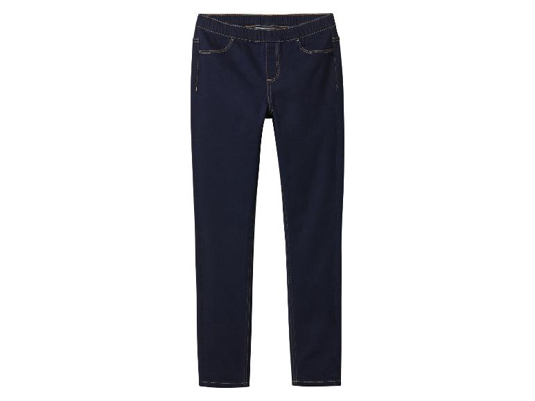 Jean skinny bleu foncé avec taille élastique et surpiqûres contrastantes.