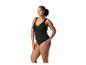 Femme en maillot de bain une pièce noir avec des liens à la taille.