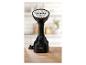 Défroisseur vapeur portable SilverCrest noir sur une table en bois.