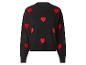 Pull noir avec des cœurs rouges