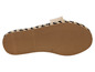 La semelle d'une espadrille beige avec un ruban noir.