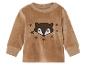 Pull brun à manches longues pour bébé avec un motif de renard et d'étoiles.