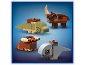 Quatre petites figurines de dinosaures construites avec des briques colorées.