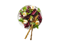 Salade de radicchio avec mozzarella, basilic et couverts dorés.