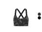 Soutien-gorge de sport à motif camouflage gris et noir avec bretelles croisées.