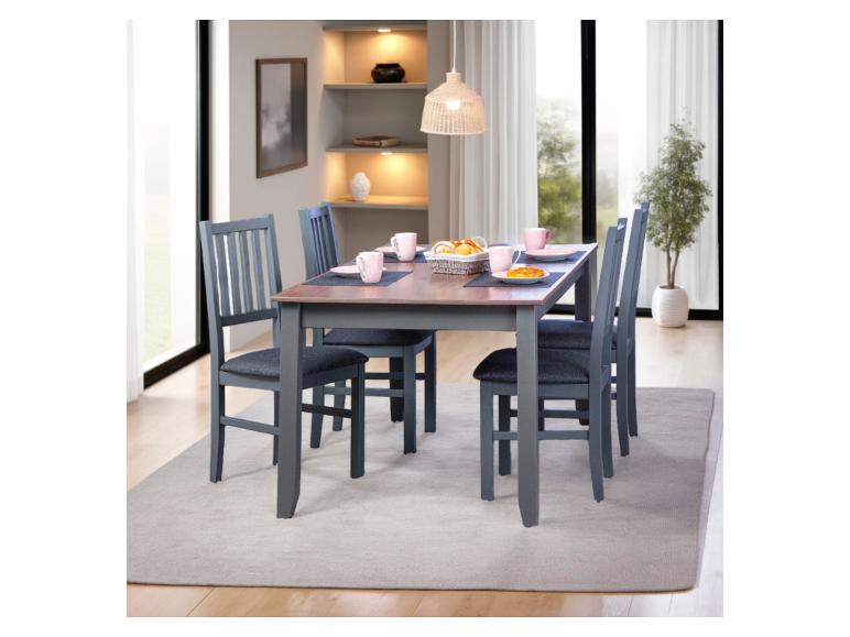 Salle à manger : table et quatre chaises grises.