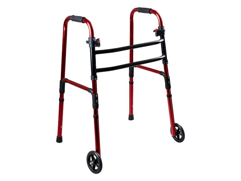 Déambulateur pliable rouge et noir avec roues avant.