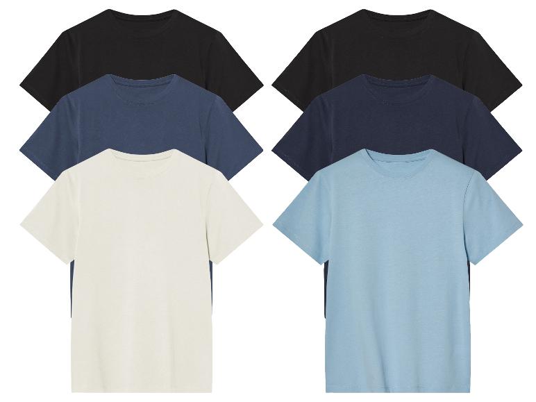 Six t-shirts à manches courtes et col rond en noir, bleu marine, beige et bleu clair.