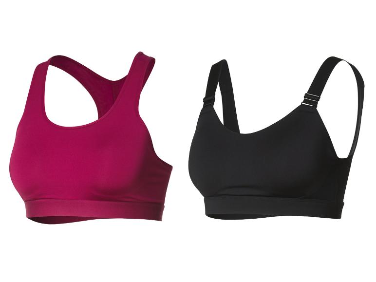 Deux soutiens-gorge de sport, un rose et un noir.