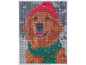 Modèle de broderie diamant représentant un golden retriever avec un bonnet rouge et une écharpe verte.