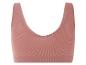 Un soutien-gorge de sport rose à côtes.