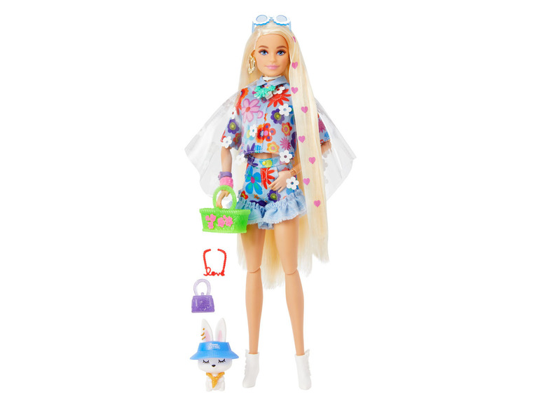 Poupée Barbie aux longs cheveux blonds, motif floral et accessoires.