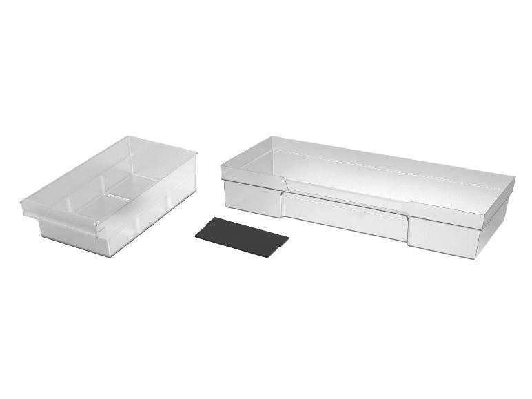 Deux boîtes de rangement transparentes et un séparateur noir sur fond blanc.