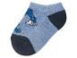Chaussettes courtes bleues à motif dinosaure.