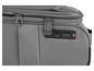 Gros plan sur une valise grise avec une serrure TSA.