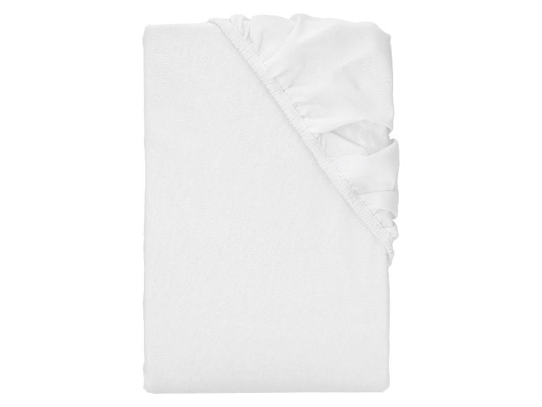 Drap-housse blanc plié