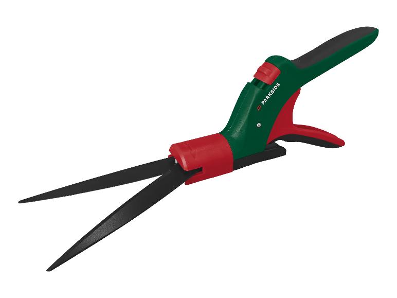 Cisaille à gazon et arbustes Parkside en vert et rouge.