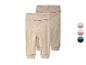 Deux paires de pantalons de bébé en jersey, un beige clair et un marron clair.