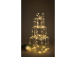Décoration lumineuse de boîte cadeau de Noël avec une boule blanche et une branche de sapin.
