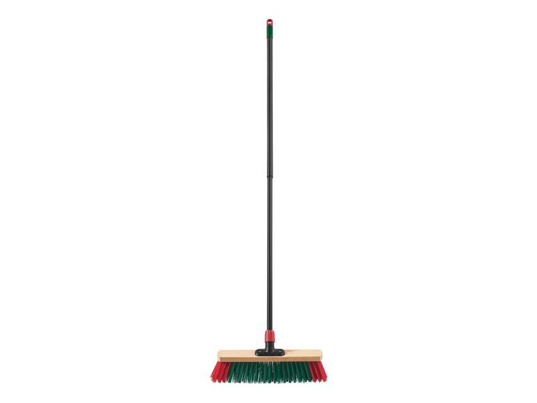 Un balai avec un manche long et des poils verts et rouges.