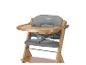 Chaise haute en bois avec assise rembourrée grise et harnais de sécurité, avec plateau amovible.