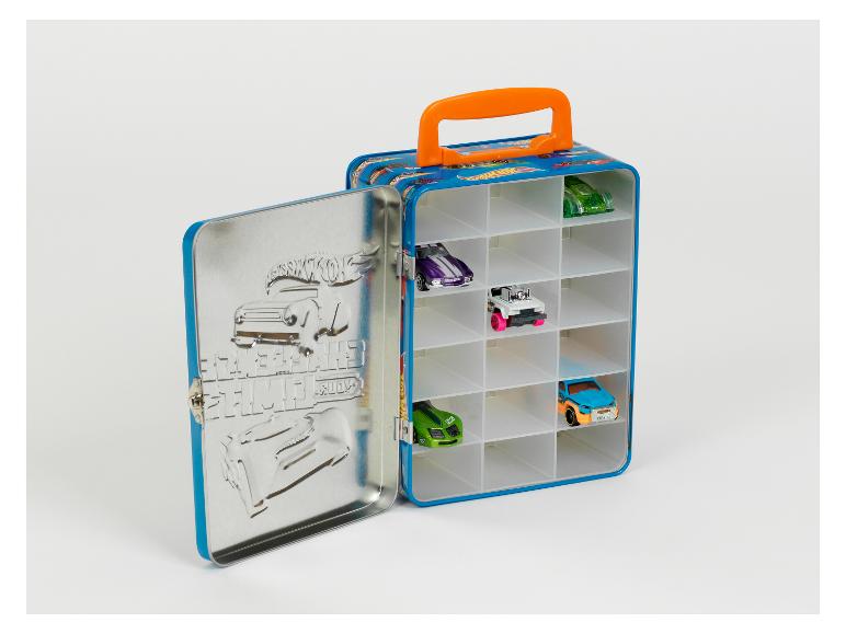 Une boîte métallique Hot Wheels bleue ouverte avec des voitures jouets à l'intérieur.