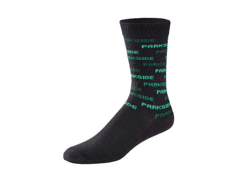 Chaussette noire avec un motif répété du mot « PARKSIDE » en vert clair.