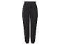 Pantalon de survêtement noir avec cordon de serrage à la taille et poches zippées.